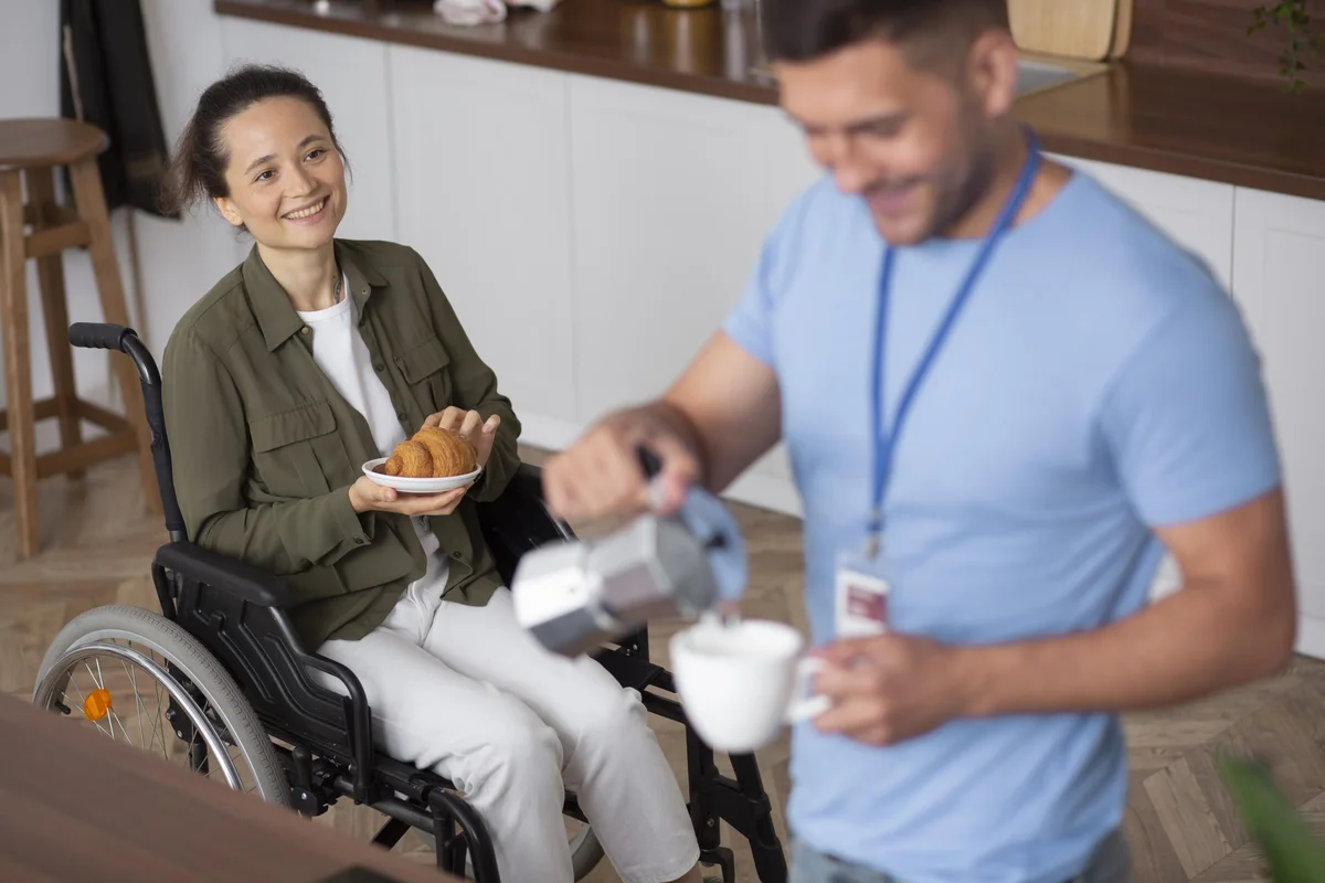 Support worker sharing a warm moment with a client