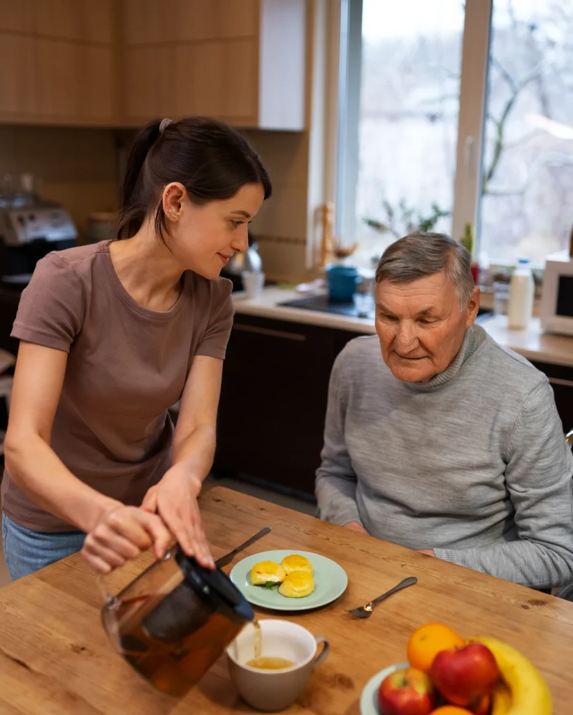 female-caretaker-with-client-home-doing-her-job
