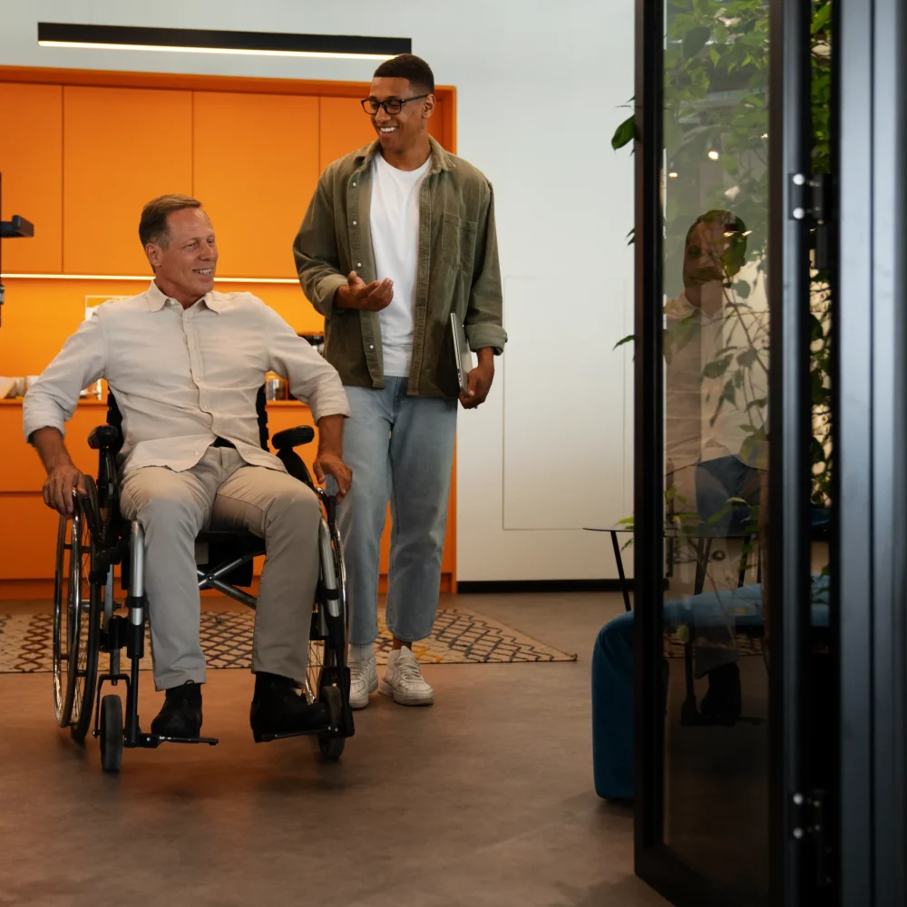man-wheelchair-having-inclusive-office-job