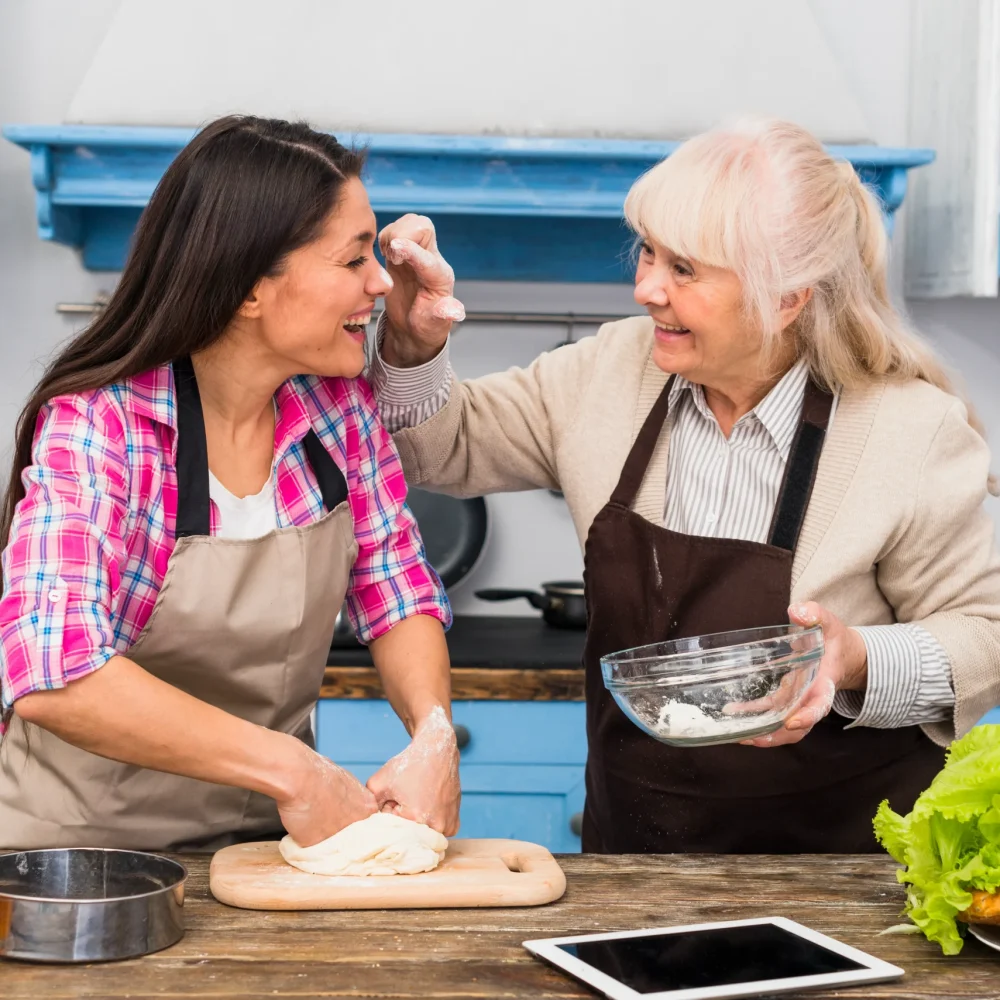 senior-mother-her-daughter-making-fun-while-kneading-dough senior-mother-her-daughter-making-fun-while-kneading-dough